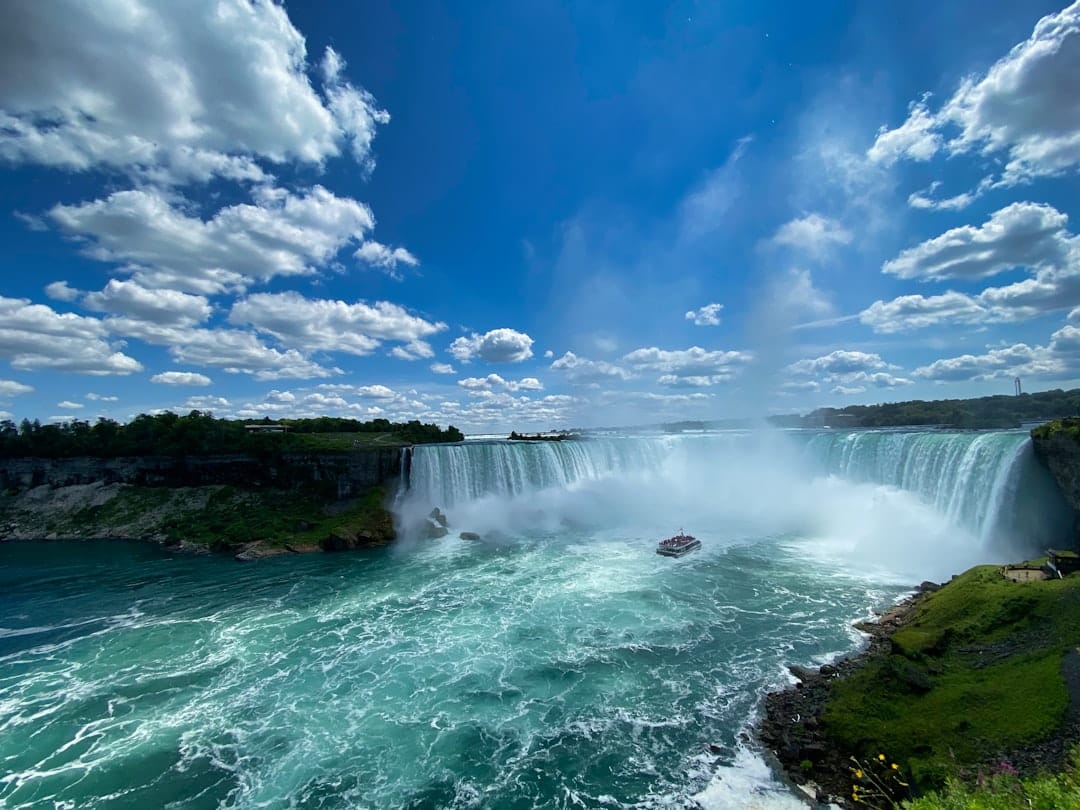 Niagara Falls waterfalls under blue sky in Ontario Canada