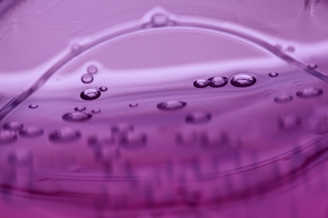 Purple liquid representing nanoemulsion technology used in nano THC products like CannaLean syrup