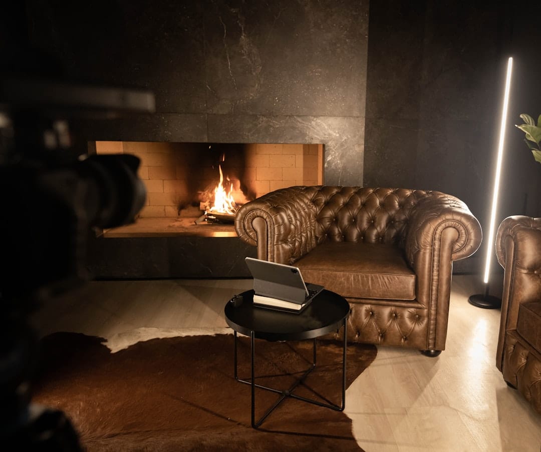 Cozy living room with fireplace and warm lighting perfect for an evening indica cannabis session