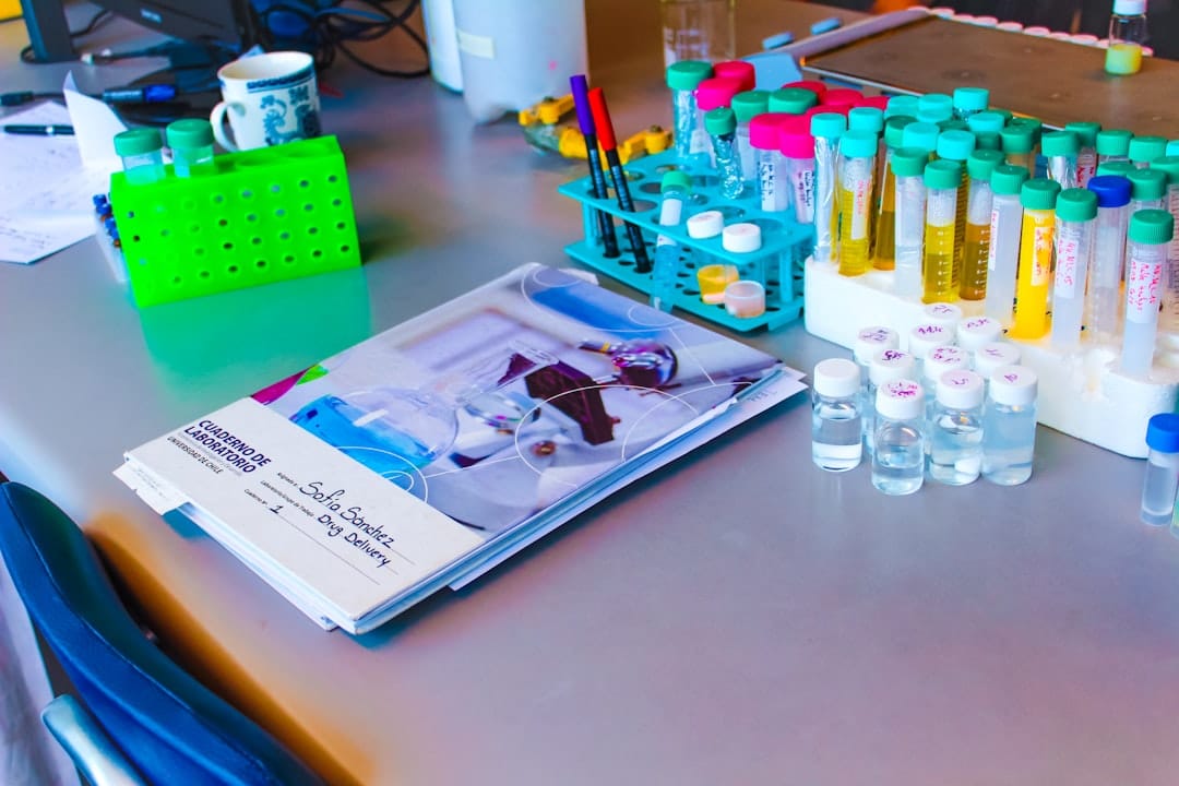 Laboratory bottles and research equipment representing CBD scientific studies and clinical trials