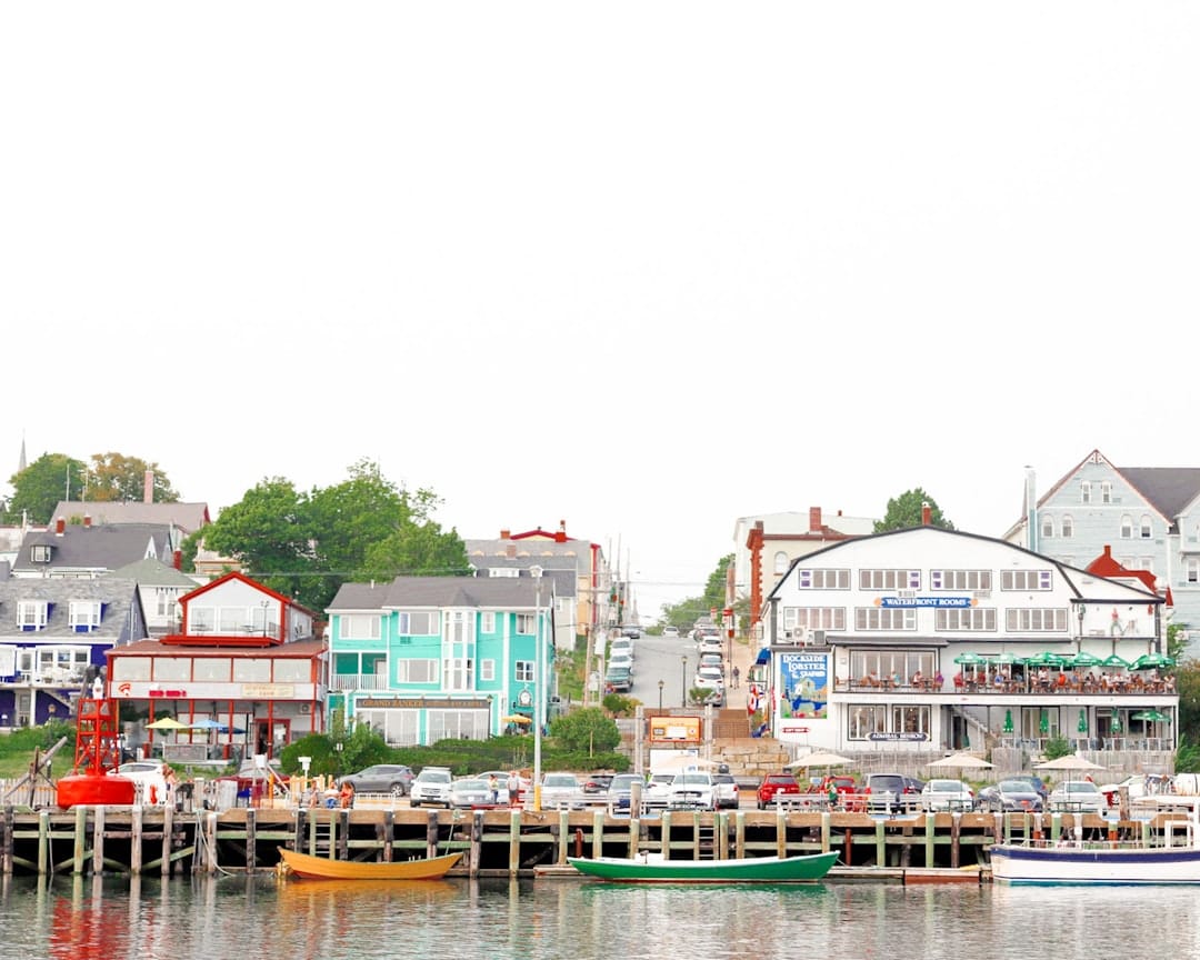 Colourful boats docked at a Nova Scotia fishing village harbour