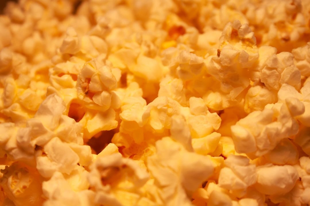 Close up of popcorn for a cozy movie night 4/20 celebration at home
