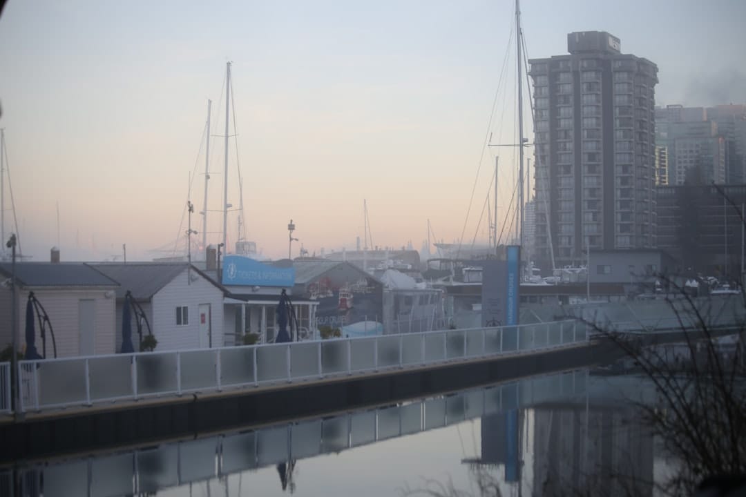 Vancouver harbour with boats docked in peaceful morning fog