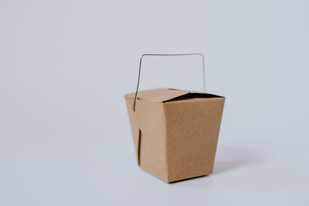 Small brown cardboard parcel ready for Canada Post Xpresspost delivery