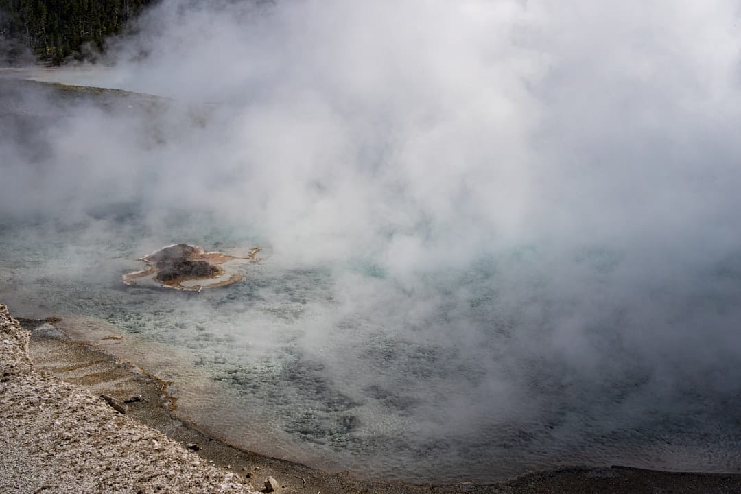 Steam rising from mineral water evoking Moose Jaw Temple Gardens spa relaxation