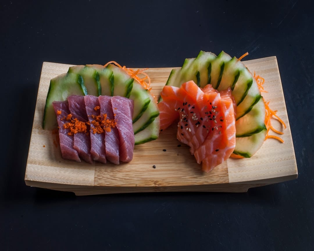 Plate of fresh raw tuna fillet, a playful nod to the BC tuna-family cannabis lineage that includes Bluefin Tuna, Black Tuna and Tuna Kush