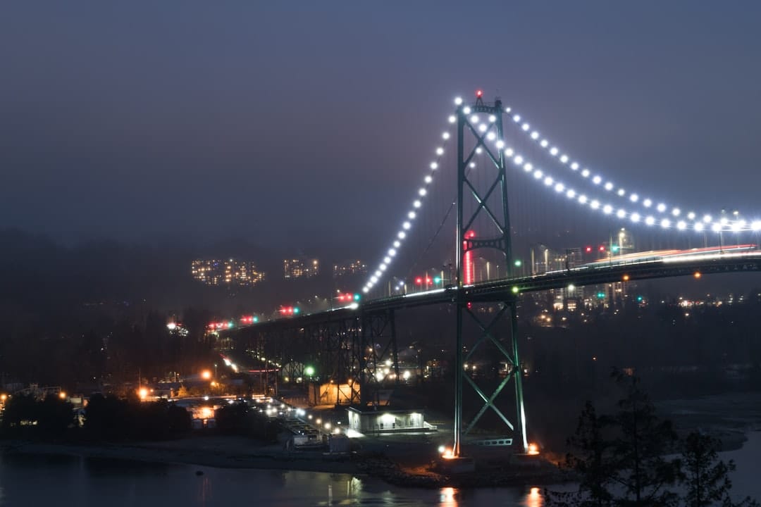 Lions Gate Bridge between Vancouver and North Vancouver lit up at night