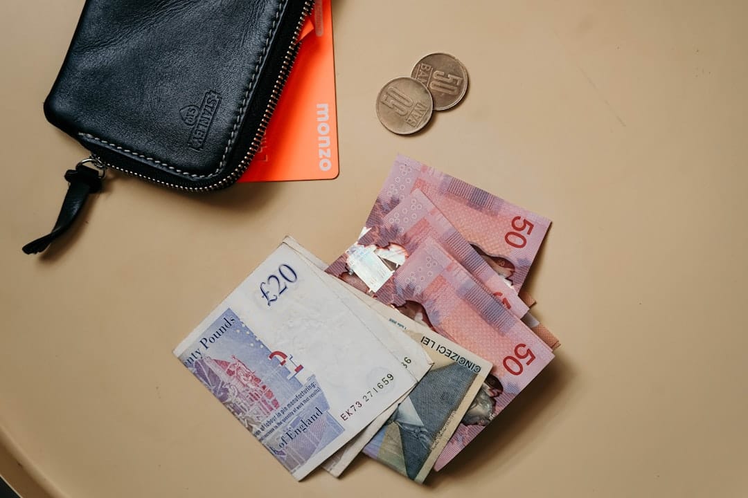 Canadian banknotes on a table representing the cost of legal cannabis in Canada