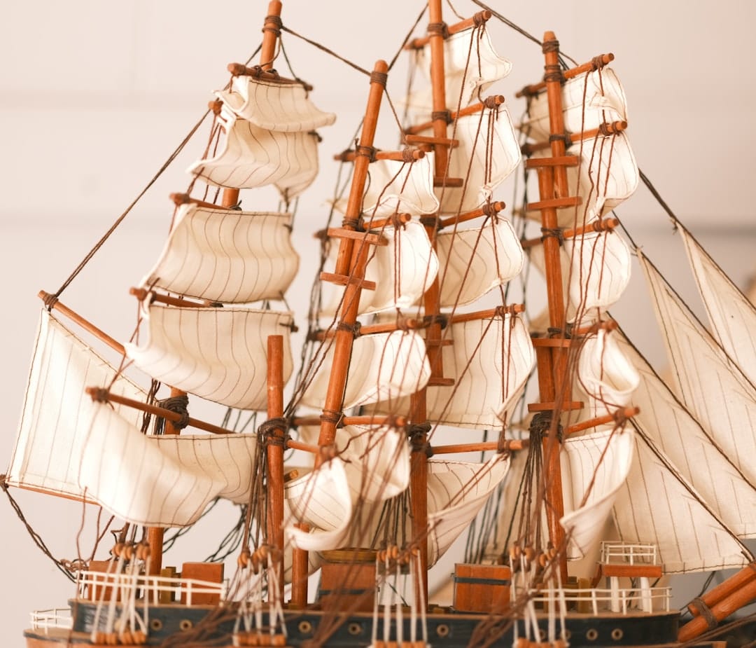Wooden tall ship at a Nova Scotia waterfront representing Pictou heritage