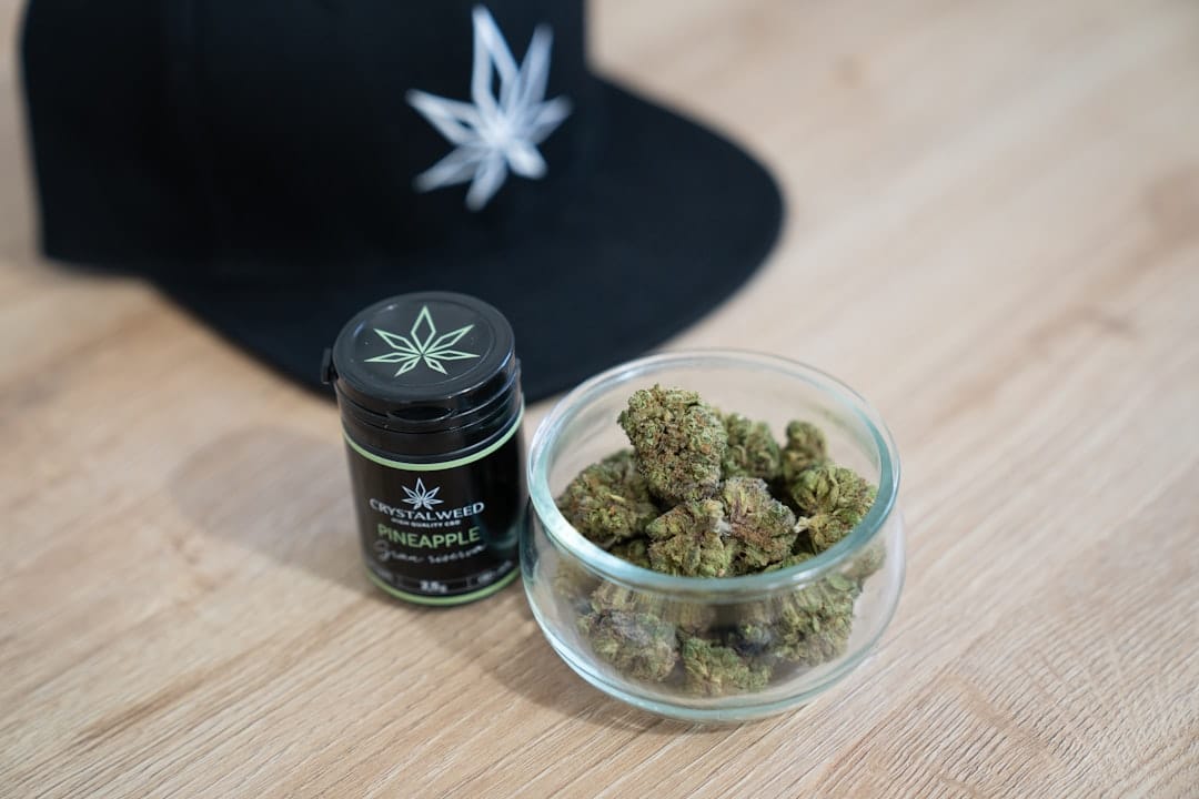 Craft cannabis flower in artisan glass bowl representing premium BC concentrate culture
