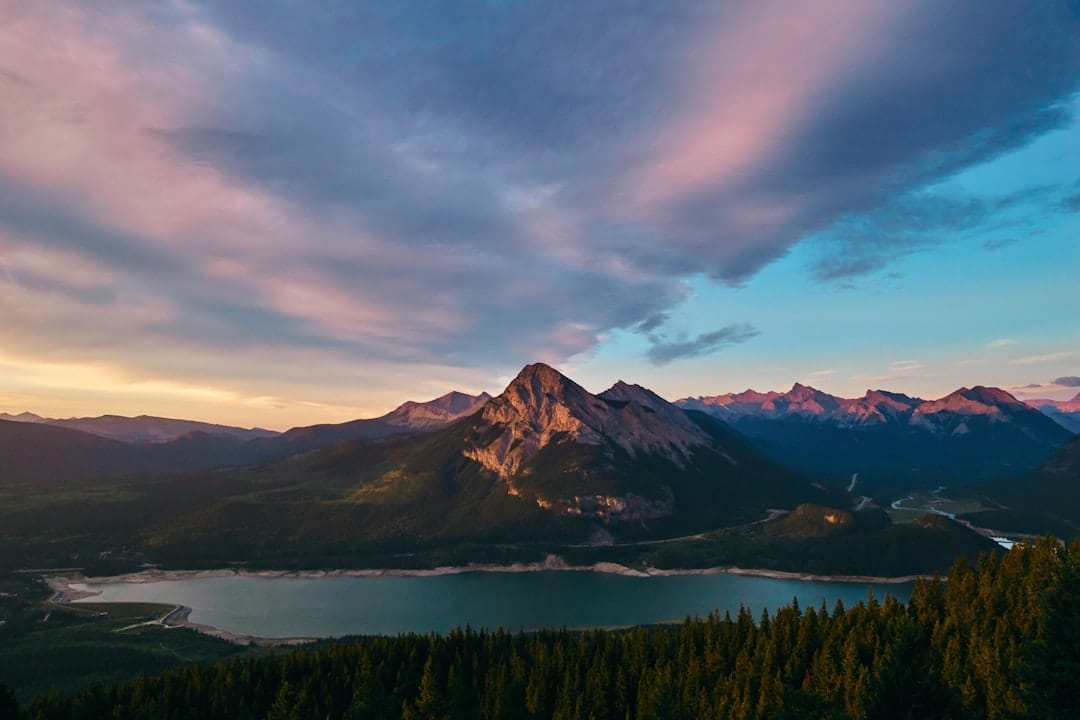 Bow Valley alpine forest with snow-capped Rocky Mountain peaks