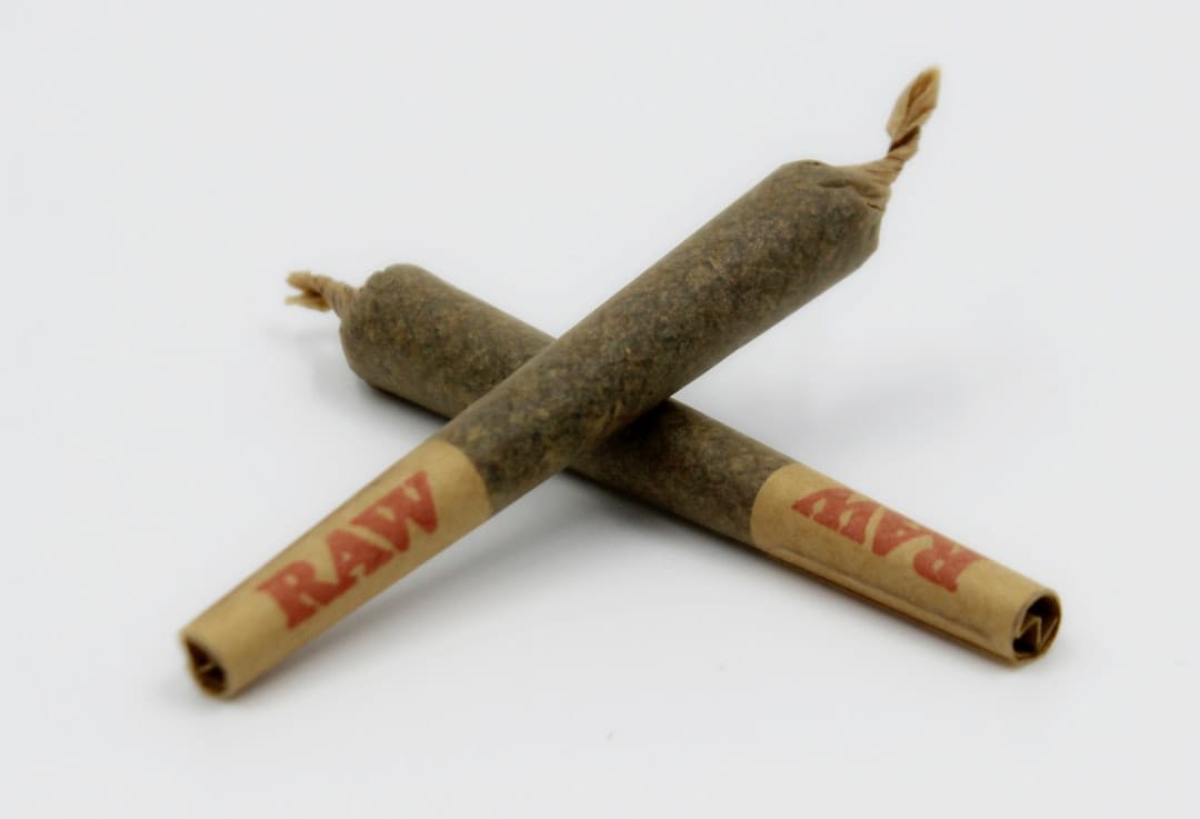 Pre-roll joint close-up representing hash hole infused format