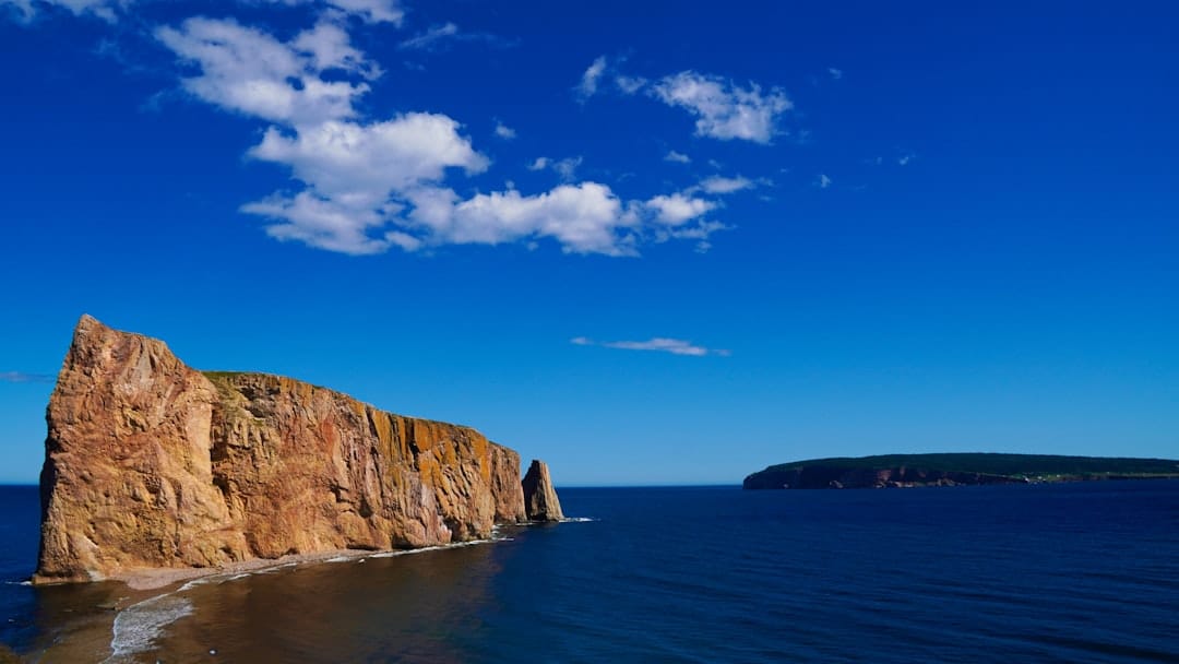 Red sandstone cliffs and ocean on Prince Edward Island, the home of Charlottetown