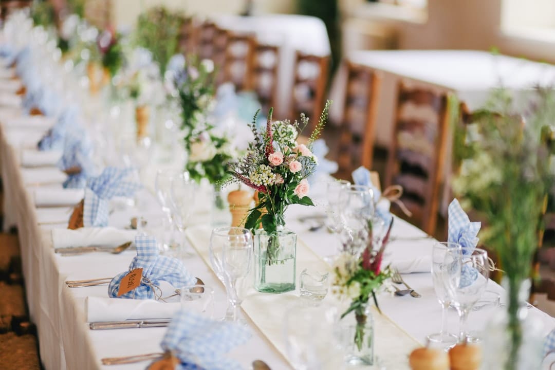 Elegant dinner table with wine glasses set for cannabis and food pairing evening