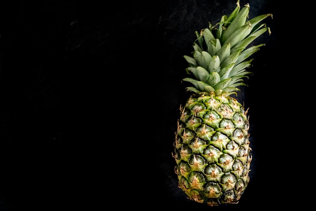Fresh green pineapple representing the tropical pineapple flavour profile of Pineapple Jack cannabis strain