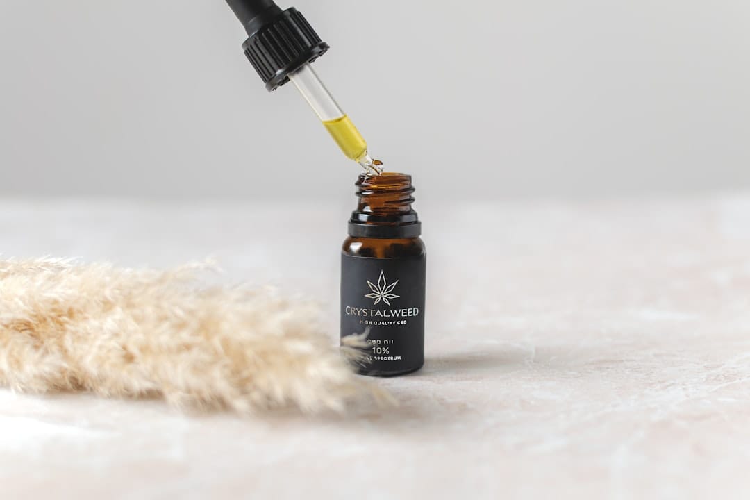CBD tincture oil dropper bottle for sublingual dosing