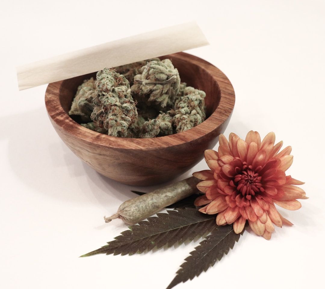 Fresh cannabis flower buds arranged in a bowl for weed delivery in New Westminster BC