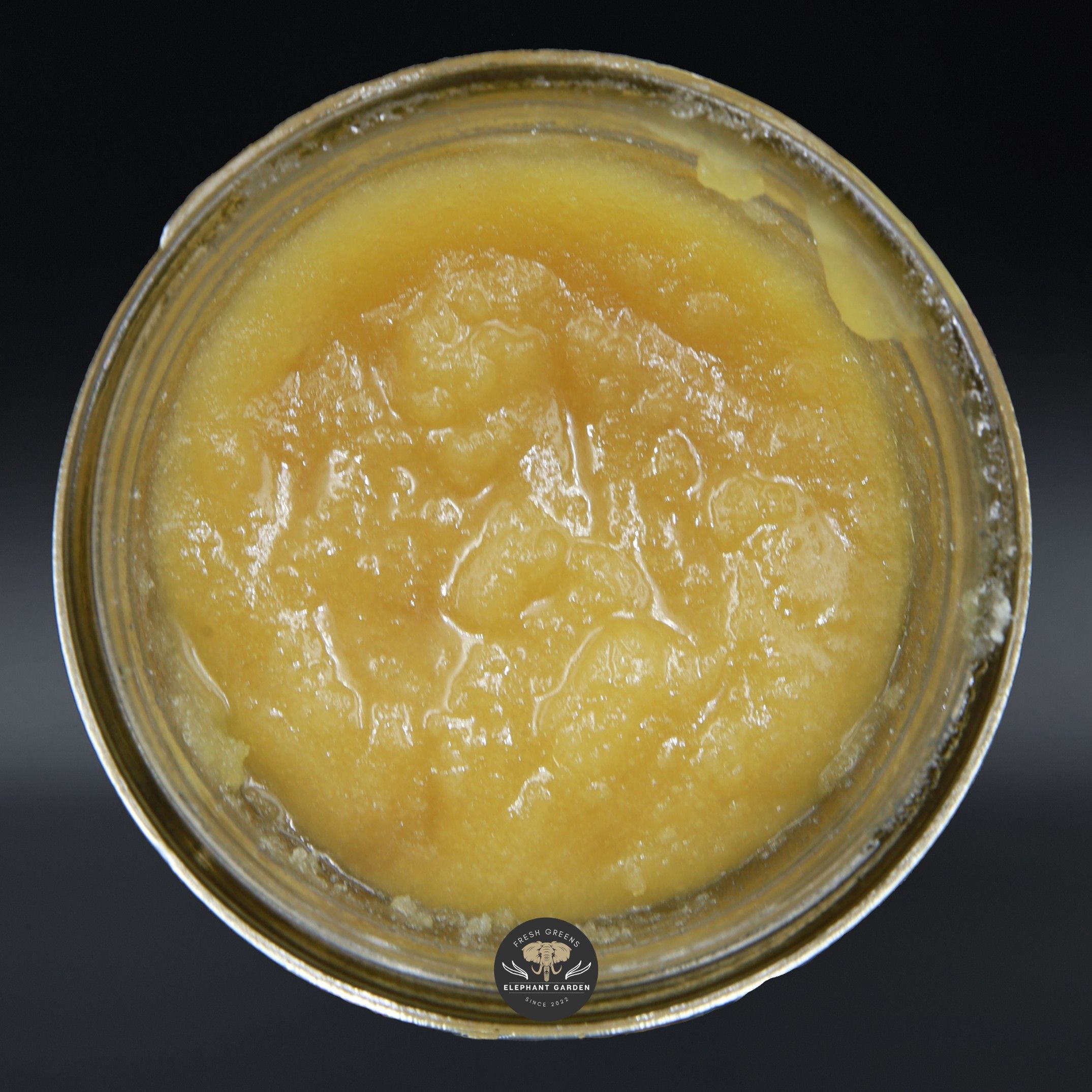 Blue Cookies Live Resin Caviar from Elephant Garden showing crystalline diamonds in golden terpene sauce