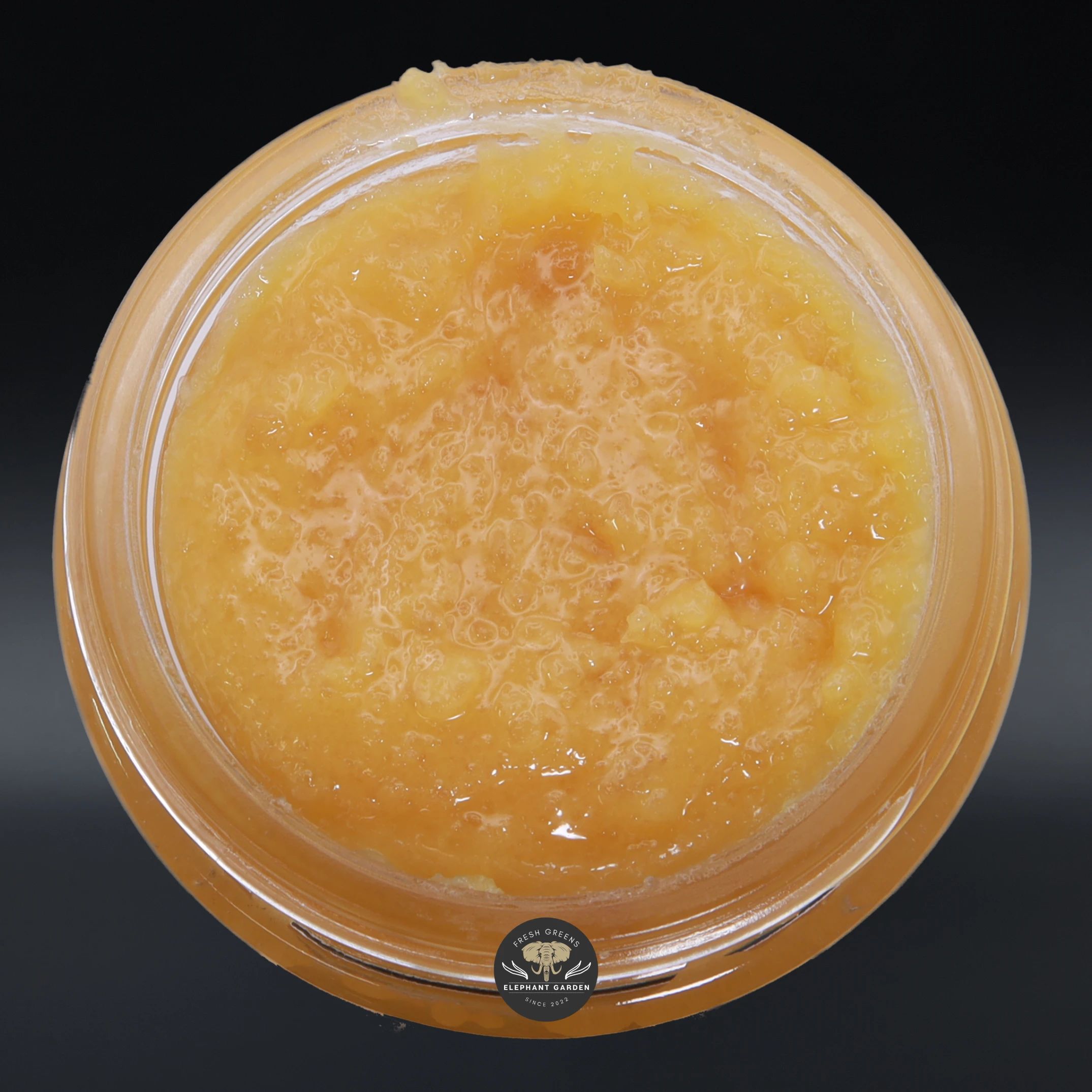 Bubblegum Cake live resin concentrate, amber sauce in a glass jar