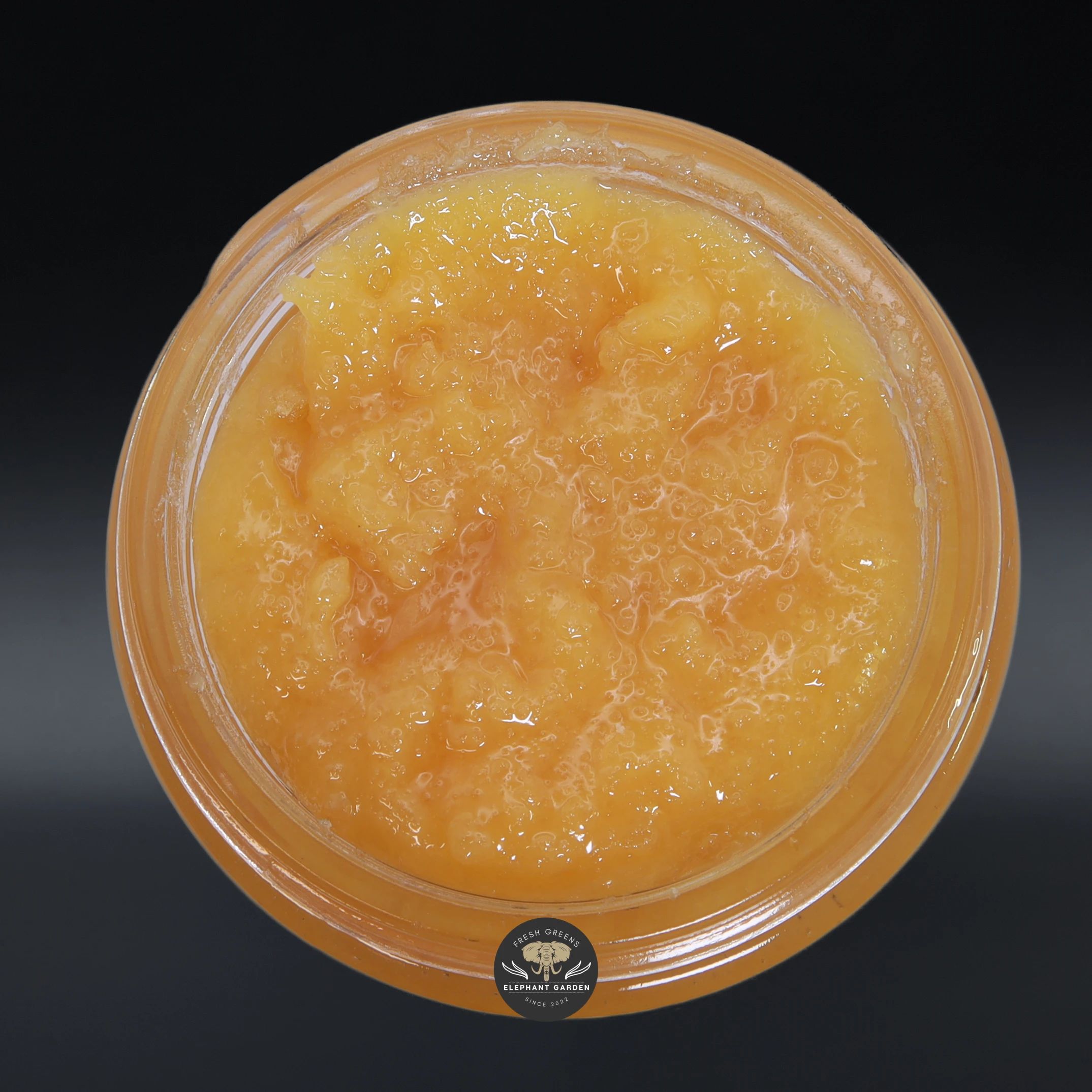 Mimosa Punch Live Resin hybrid concentrate, close-up of live resin in a glass jar