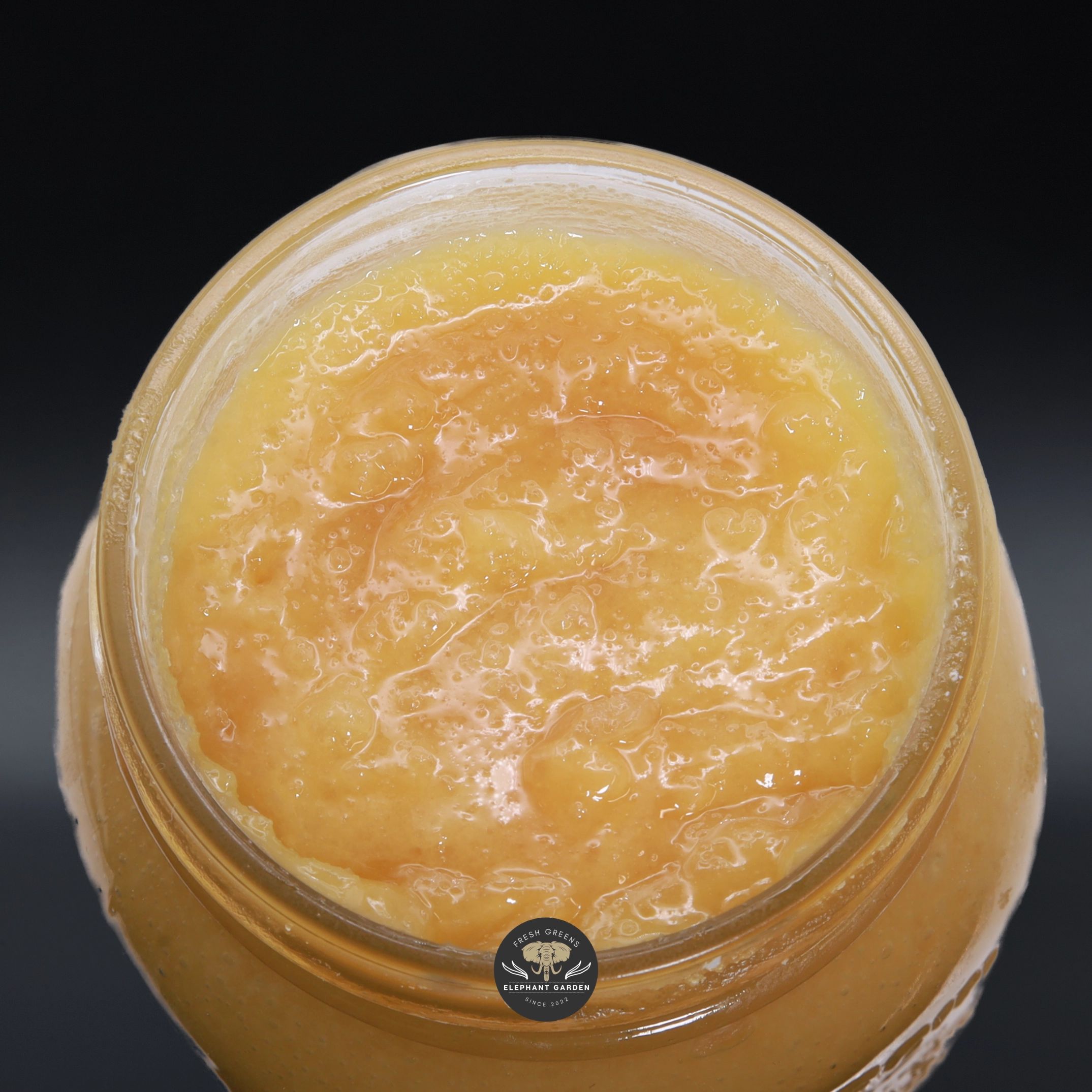 Sherb Cake Live Resin, butter-yellow live resin sauce with a glossy terpene layer in an open glass jar