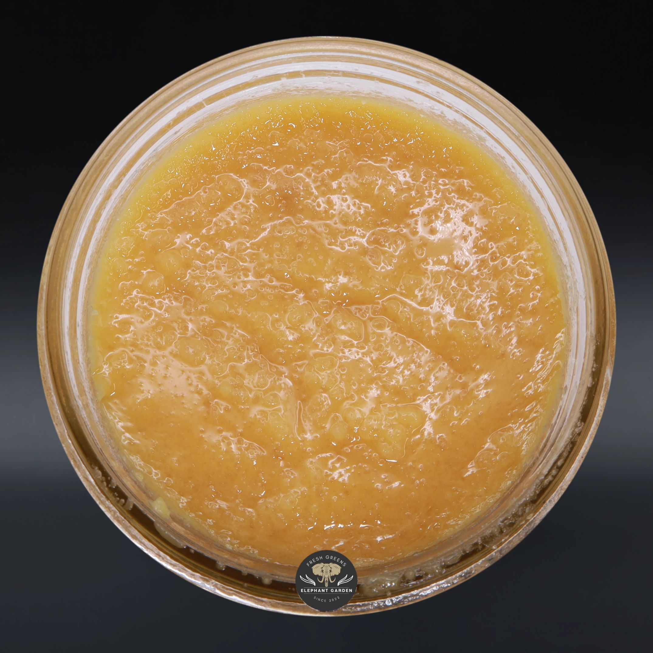 Ghost Train Haze Live Resin sativa concentrate in the jar, top-down product photo