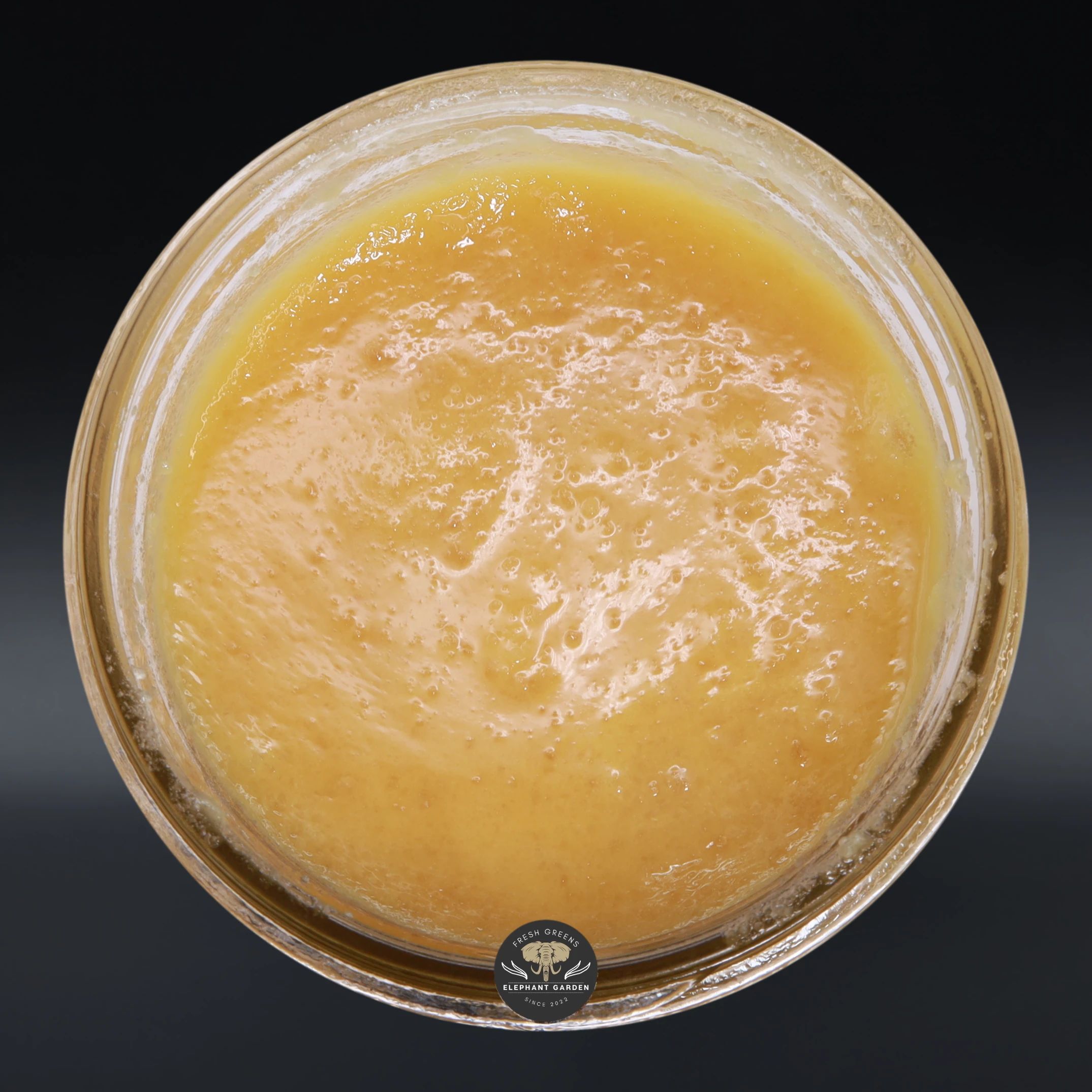 Juicy Fruit Live Resin hybrid concentrate in the jar, top-down product photo