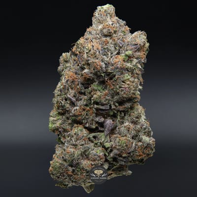 Pink Death AAAA indica flower, close-up of deep purple frosted buds