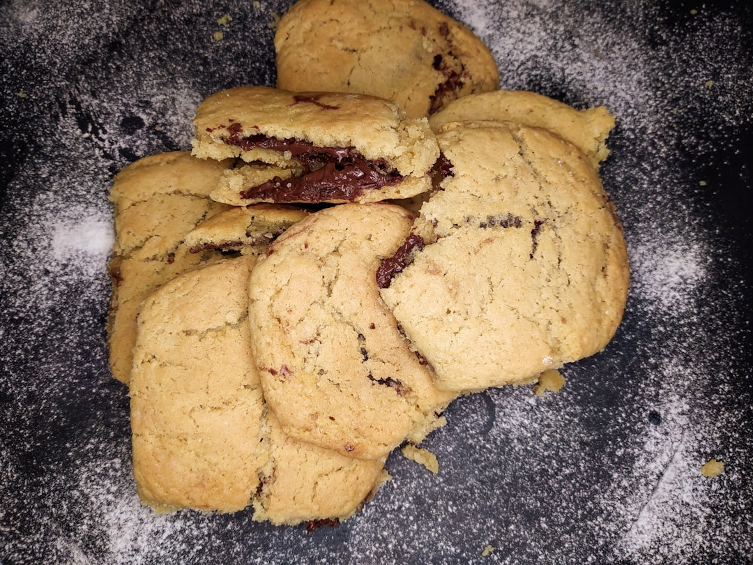 Dark biscotti cookies on a table evoking the cookie and diesel flavour of Black Biscotti cannabis strain