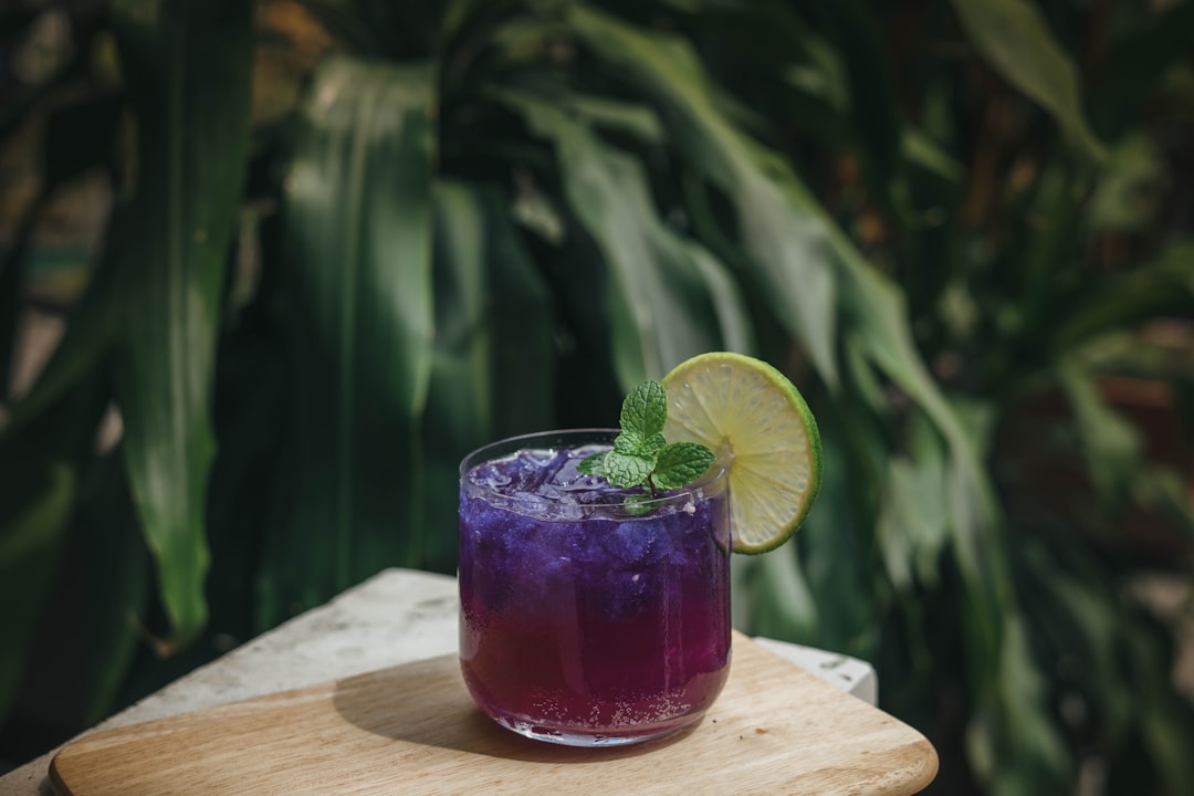 Purple and blue cannabis-infused lean drink in a glass