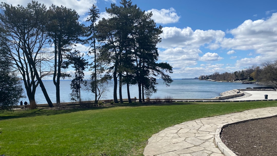 Lush green park space with Lake Ontario in the background in Oakville Ontario