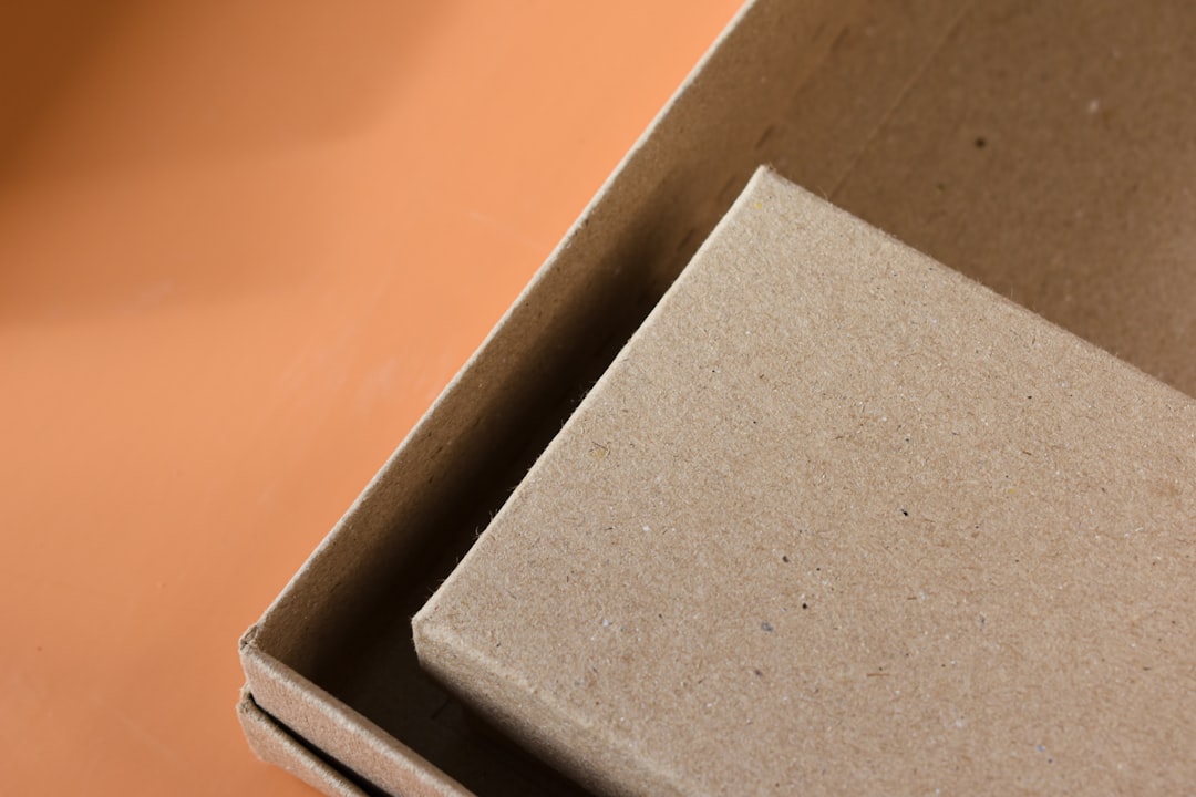 Open cardboard delivery box representing cannabis mail order delivery to Langley BC