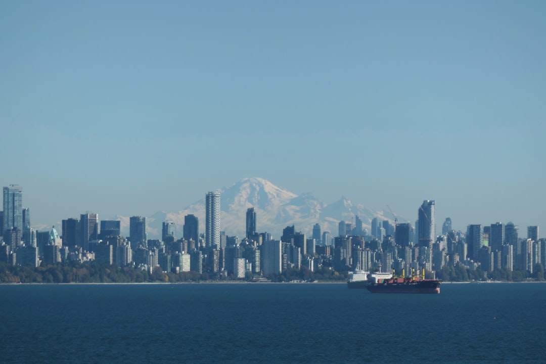 Vancouver skyline backed by snow-capped mountains representing BC craft cannabis culture